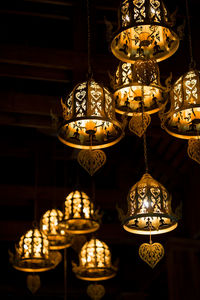 Low angle view of illuminated chandelier