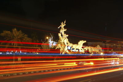 Light trails on city street at night