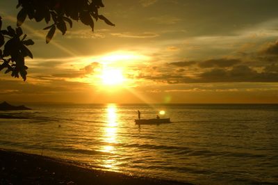 Scenic view of sea at sunset