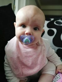 Portrait of cute baby at home