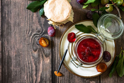 High angle view of fruits in jar on table