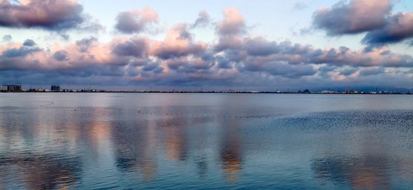 Scenic view of sea against sky at sunset