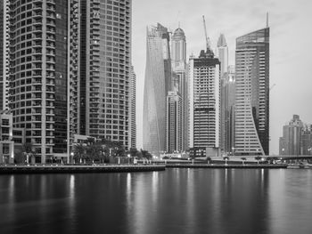 View of buildings in city at waterfront