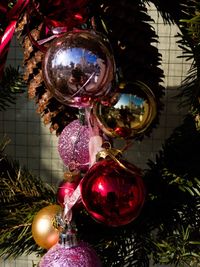 Low angle view of illuminated christmas tree at night