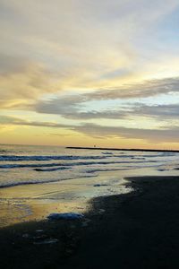 Scenic view of sea at sunset