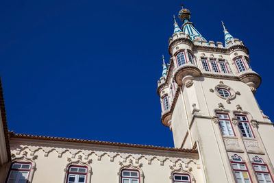 Tower of the sintra town hall building against a beautiful blue sky