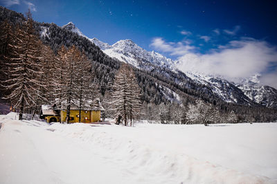 Scenic view of snowcapped mountains against sky, casaccia switzerland