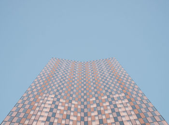 Low angle view of modern building against clear sky