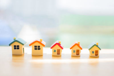 Close-up of model homes on table