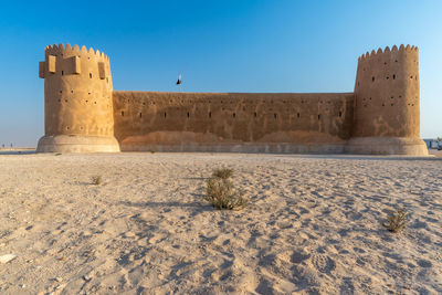 View of old ruins against clear sky