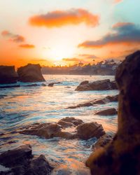 Scenic view of sea against sky during sunset