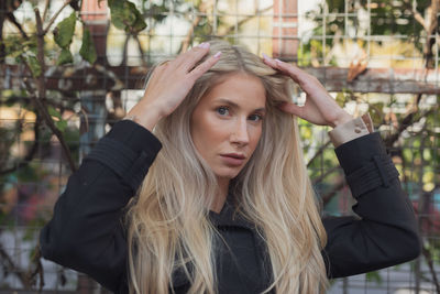 Portrait of young woman looking away