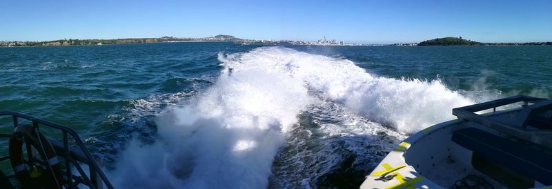 Panoramic shot of sea against clear sky