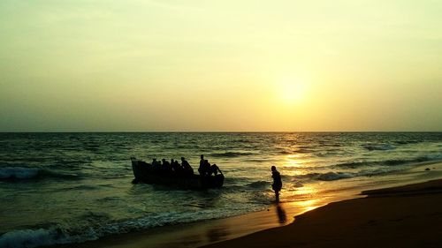 Scenic view of sea at sunset