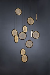 Wind chime hanging against wall