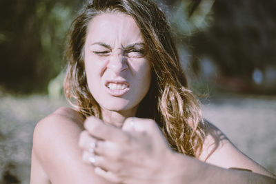 Portrait of woman making face