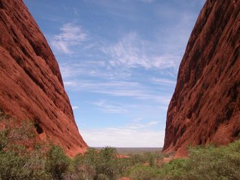 Rock formations on landscape against sky