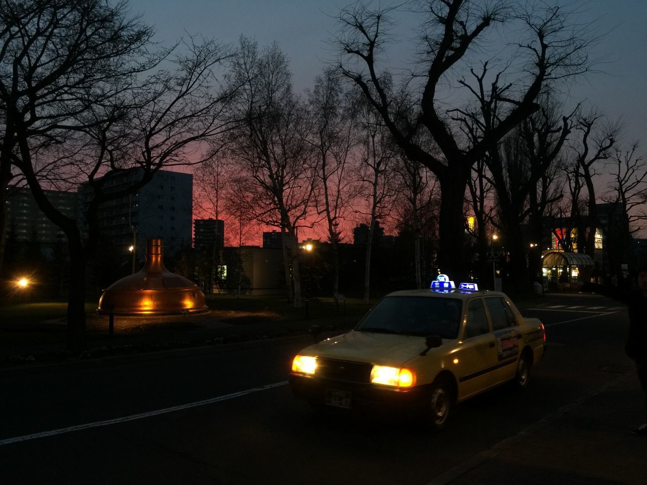 CAR ON ROAD AT NIGHT