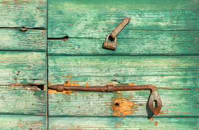 Close-up of old rusty metal door