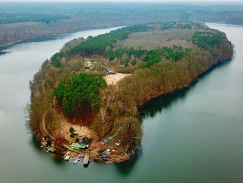 High angle view of river amidst landscape against sky