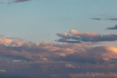 Low angle view of clouds in sky during sunset