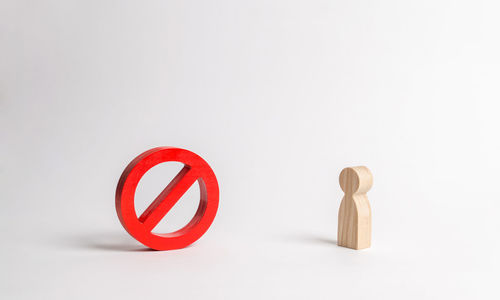 Close-up of chess pieces against white background