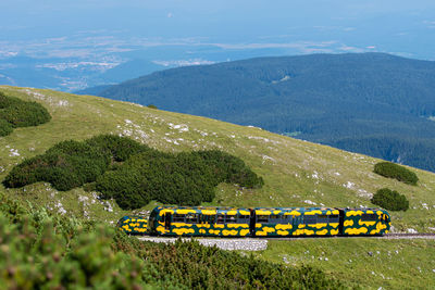 Scenic view of land and mountains