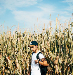 Man standing in a field fashion