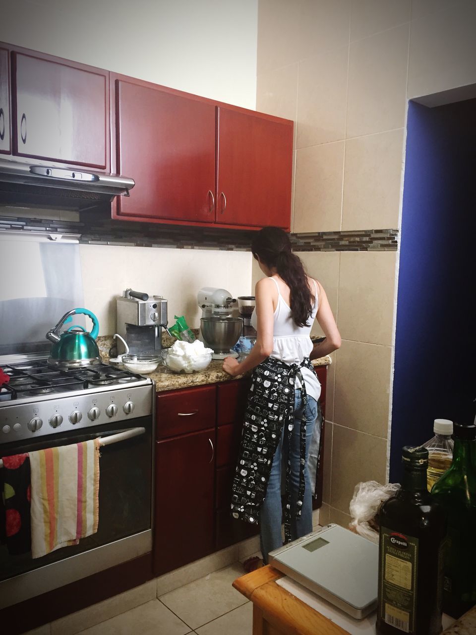 domestic kitchen, kitchen, rear view, one person, domestic room, real people, standing, indoors, cabinet, food and drink, leisure activity, lifestyles, refrigerator, food, full length, night, young adult, people