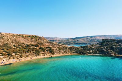 View of calm blue sea against clear sky