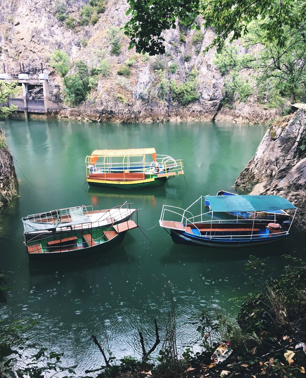 nautical vessel, mode of transport, moored, transportation, water, boat, nature, tree, day, reflection, no people, river, waterfront, rowboat, outdoors, tranquility, scenics, beauty in nature