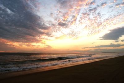 Scenic view of sea at sunset