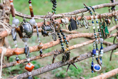 Close-up of decoration hanging on rope