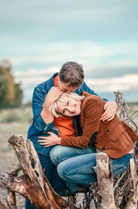 Daughter in the warm embrace of his elderly mother. mother's love.