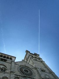 Low angle view of building against clear blue sky