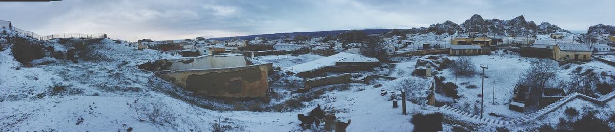 Panoramic view of houses in winter