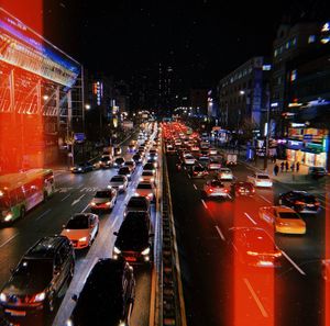 High angle view of traffic on city street at night