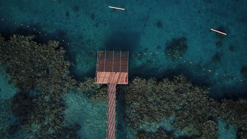 High angle view of commercial dock against sea
