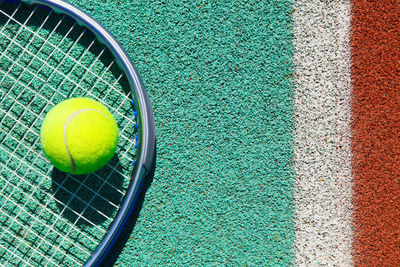 High angle view of yellow ball on grass