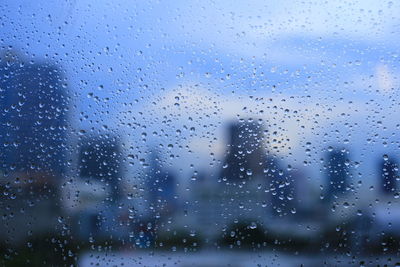 Full frame shot of wet glass window