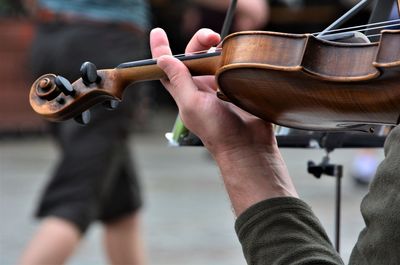 Cropped image musician playing violin