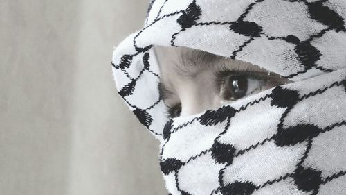 Close-up of woman with covered face