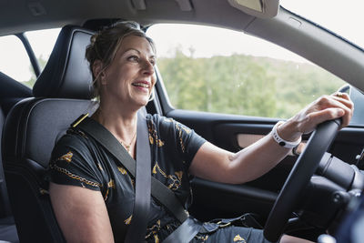 Woman driving car