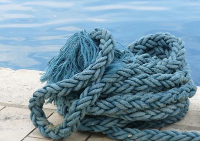Close-up of rope tied to bollard