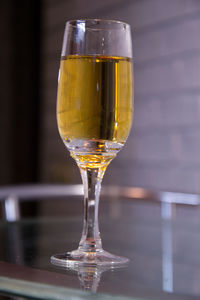 Close-up of beer glass on table