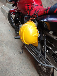 High angle view of yellow motorcycle on street