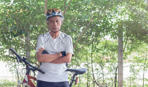 Portrait of a man with bicycle