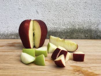 Close-up of chopped fruits on table