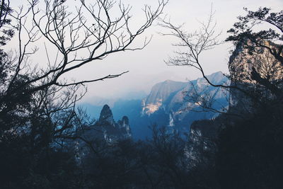 Scenic view of mountains against sky during winter