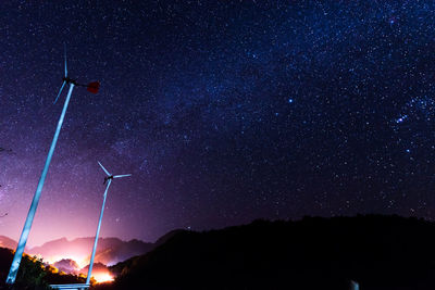 Low angle view of star field against sky at night